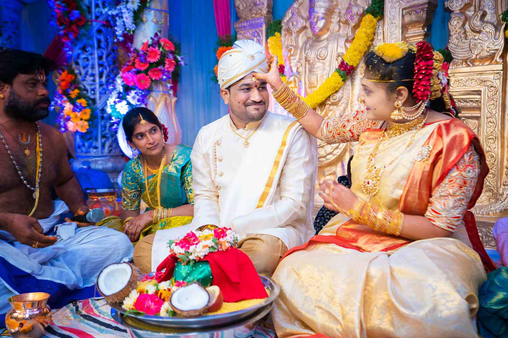 sacred-union-a-bride-applying-bottu-at-a-traditional-indian-wedding-ceremony-kalyanam-vaibhogam